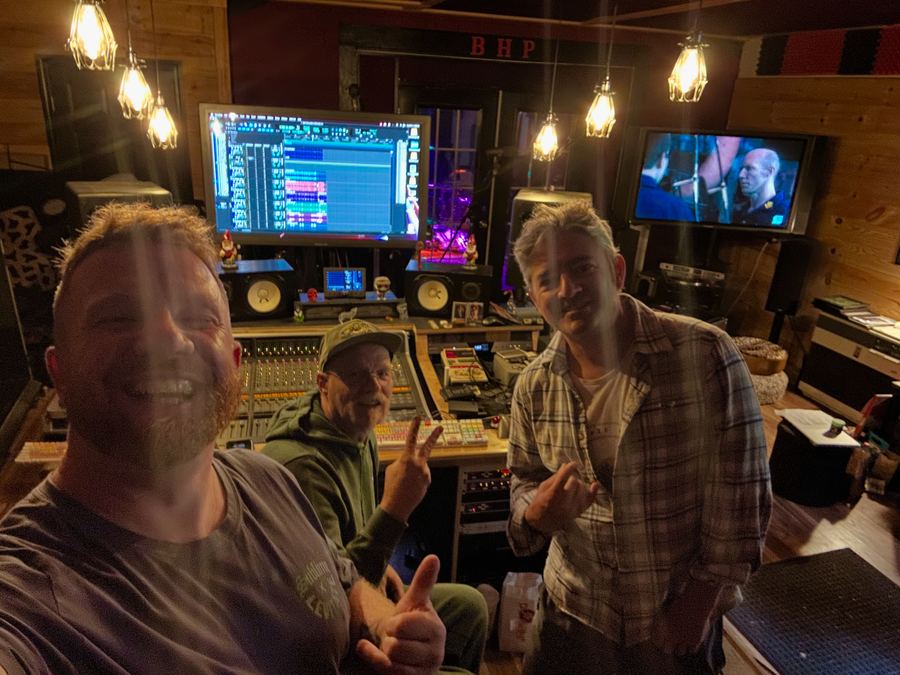 Musicians working together in a studio room